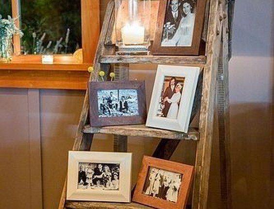 great vintage wedding decor ideas with ladders and old photos