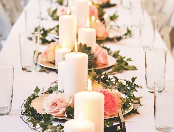 roses and candles succulent wedding centerpiece