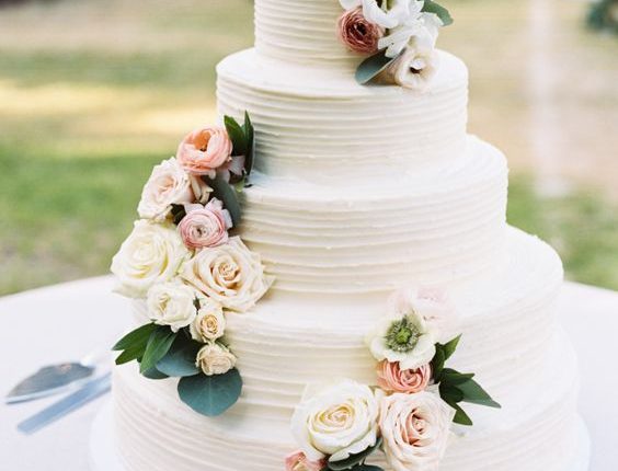rustic buttercream wedding cake with roses