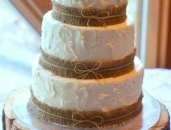rustic country buttercream wedding cake with burlap details