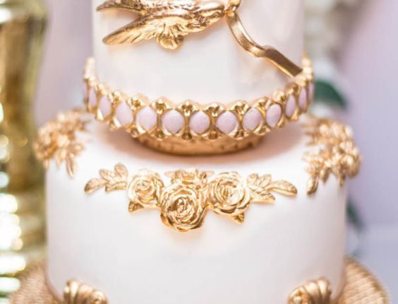 white and gold bird baroque wedding cake