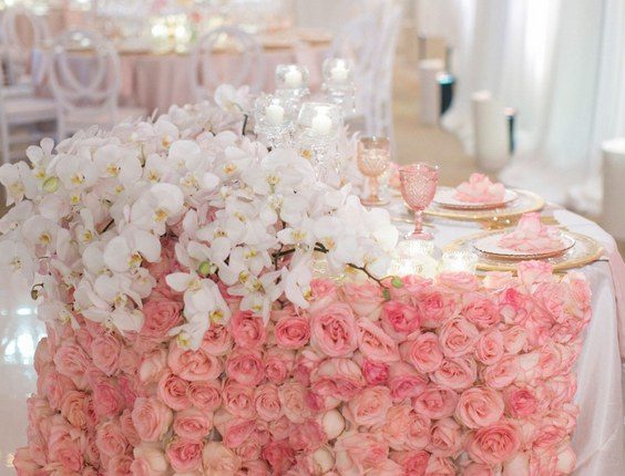 luxury pink roses and ivory orchid wedding sweetheart table
