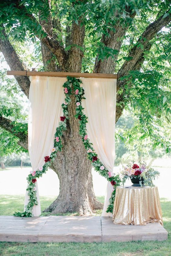 burgundy and greenery and Oak Tree wedding backdrop