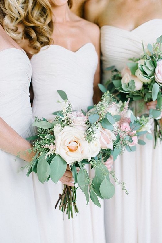 Rose, ranunculus, hydrangea, and eucalyptus wedding bouquets