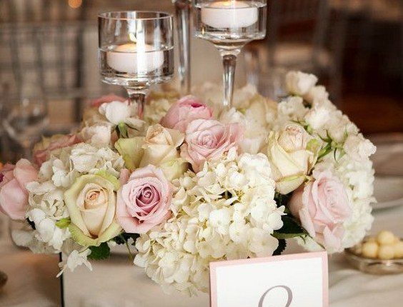 white hydrangea and blush roses wedding centerpiece