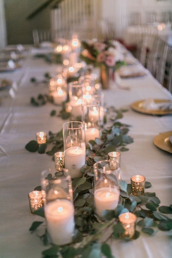 vintage candle and greenery wedding centerpiece