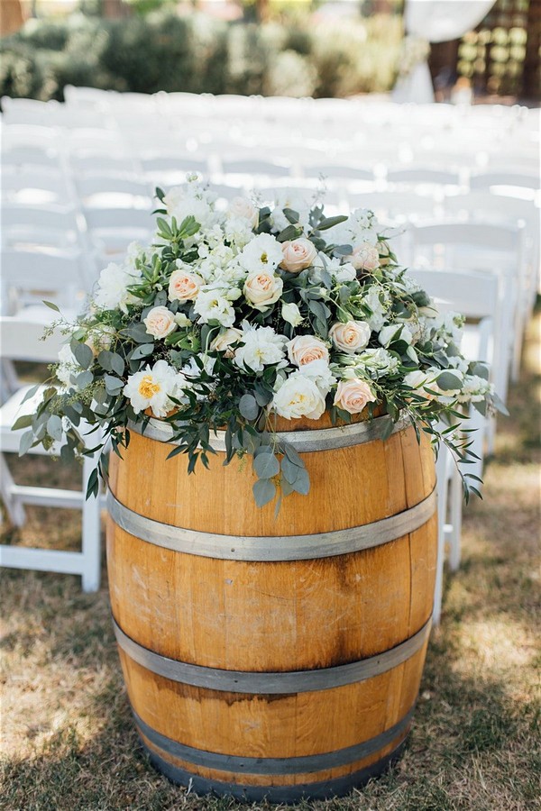 Wine Barrel Wedding Decor with Floral arrangement