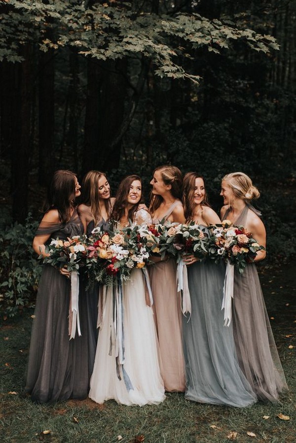 Moody bridesmaid photos with grey, blush and blue mismatched dresses