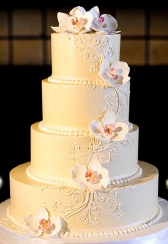 Buttercream wedding cake with sugar orchids