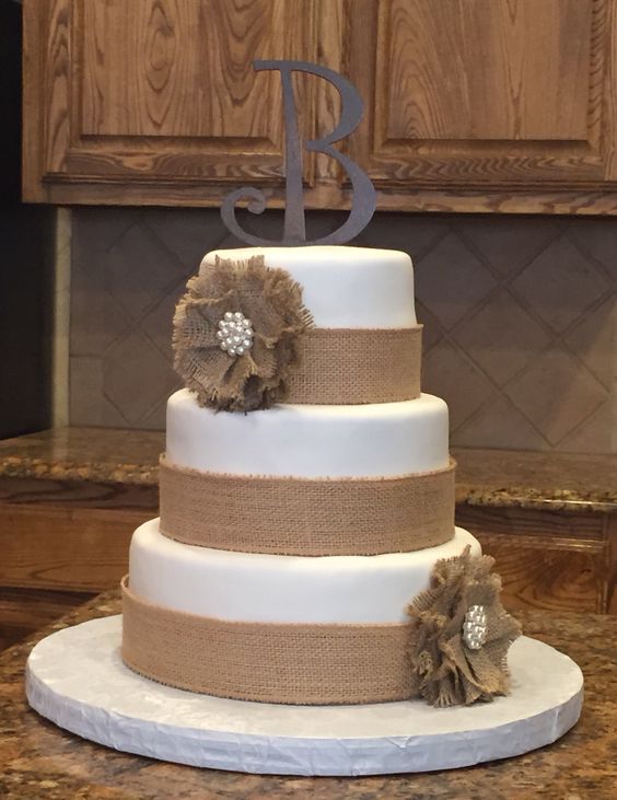 Country wedding cake with burlap accents