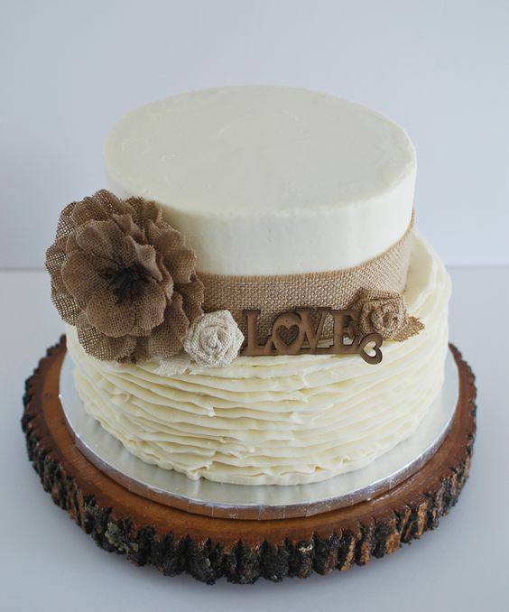 Rustic wedding cake with burlap and buttercream ruffles