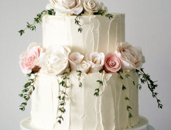 Two tier white textured wedding cake