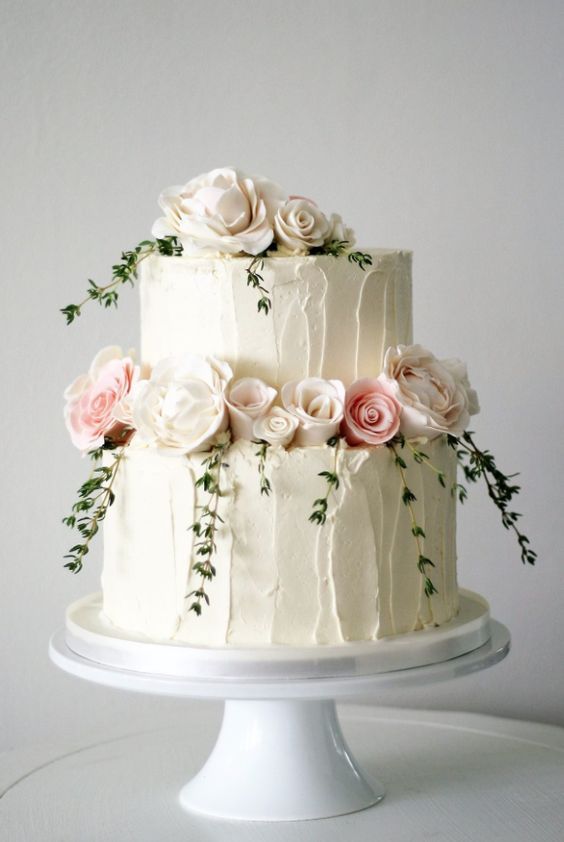 Two tier white textured wedding cake