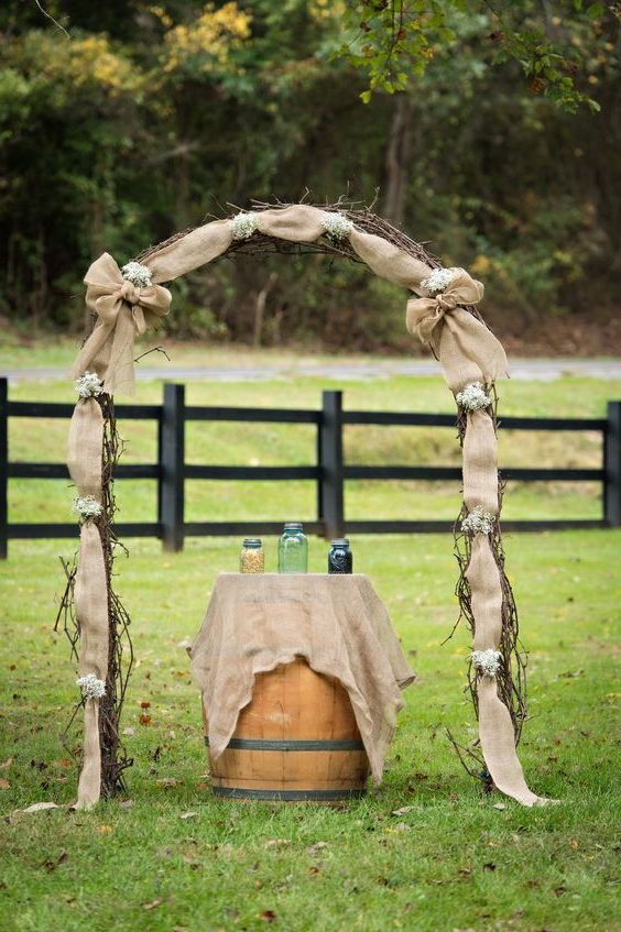 Wine Barrell Grapevine Arch with Burlap and Baby's Breath