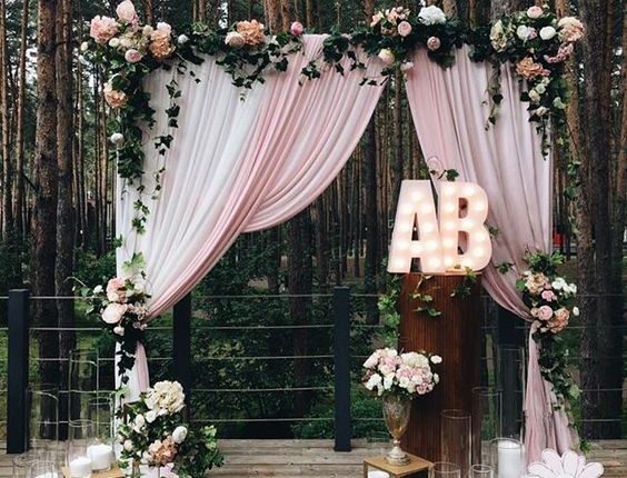 blush and ivory wedding arch