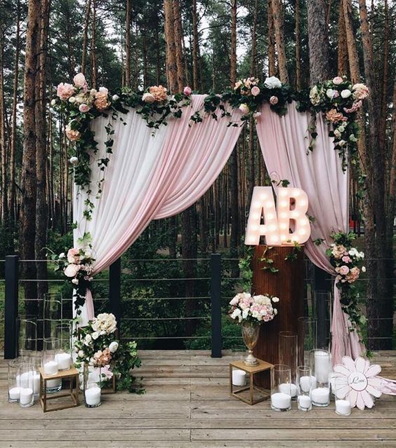 blush and ivory wedding arch