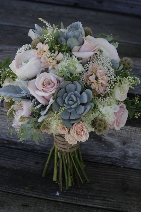 bouquet featuring succulents, dusty pink roses and peonies