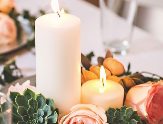 candle and succulent wedding centerpiece