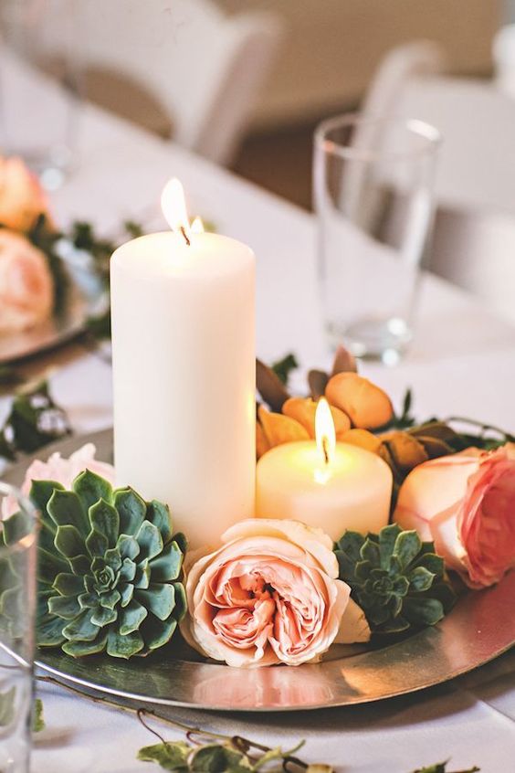 candle and succulent wedding centerpiece