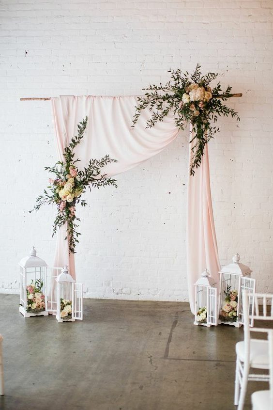 draped wedding arch by Blossom Farm Vintage Rentals