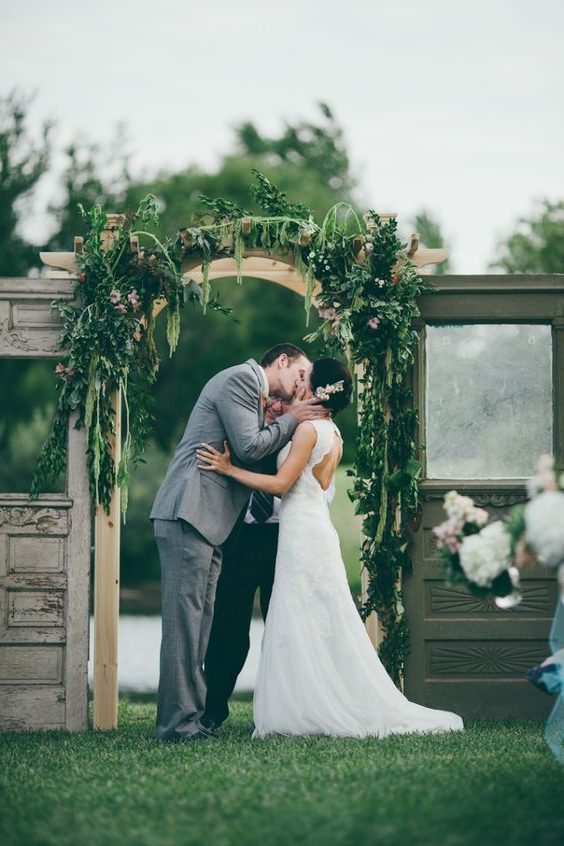 greenery and old door wedding backdrop