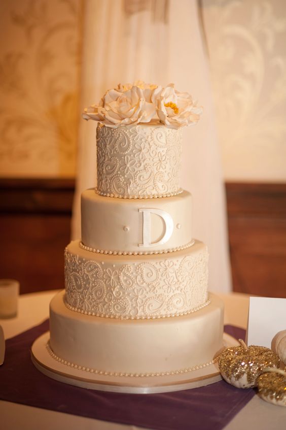 ivory elegant wedding cake