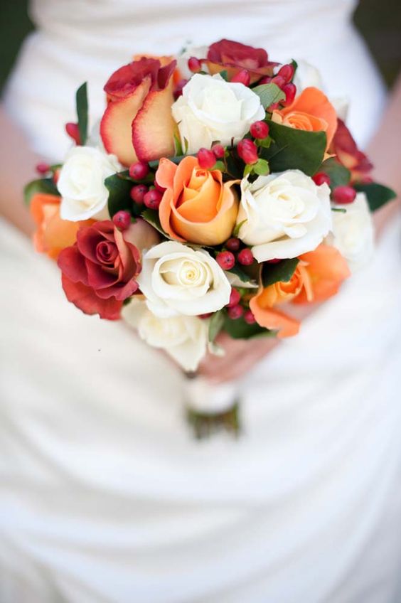 ivpry and orange fall wedding bouquet