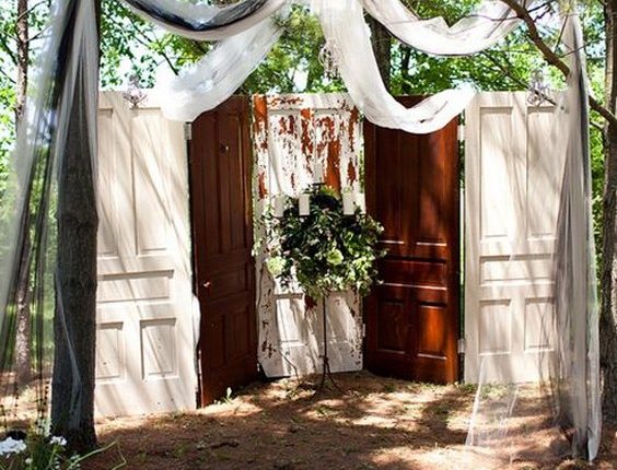old doors backyard wedding backdrop