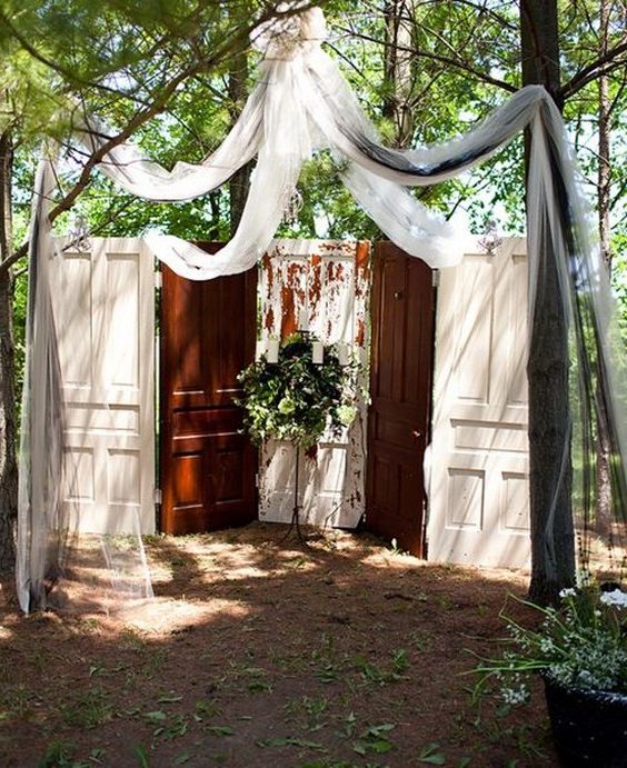 old doors backyard wedding backdrop