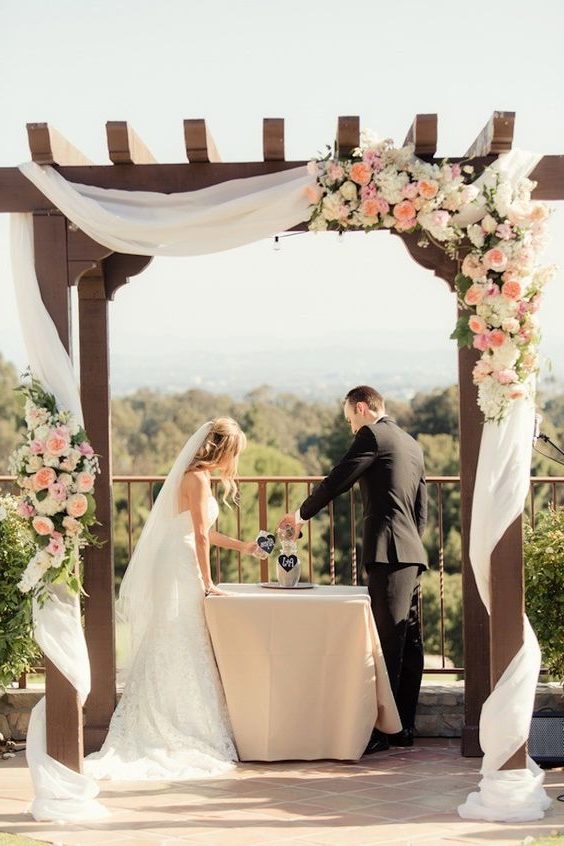 roses, peonies wedding arch