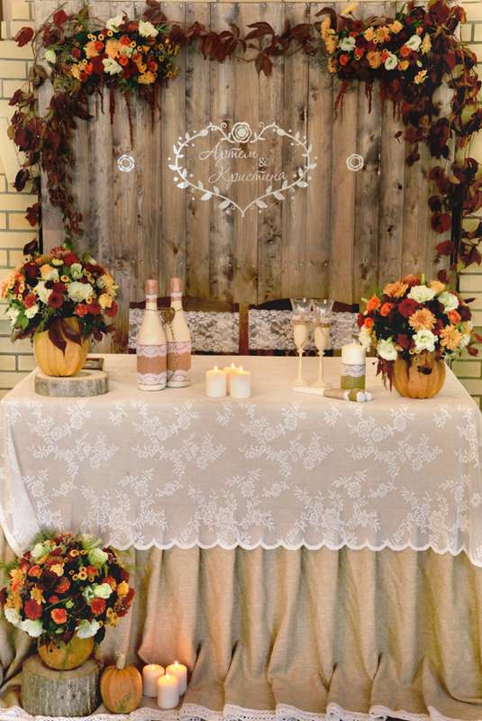 rustic burgundy and orange fall wedding recetion sweetheart table decor