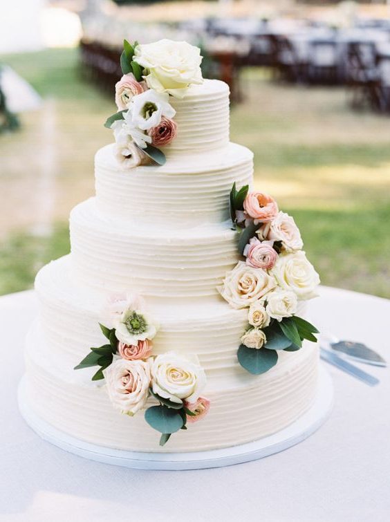 rustic buttercream wedding cake with roses