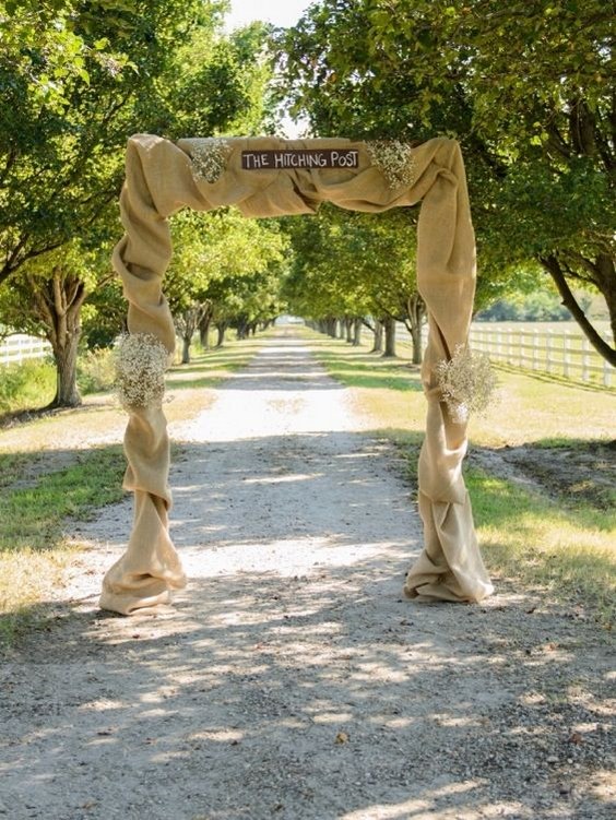 rustic country burlap and baby's breath wedding arch