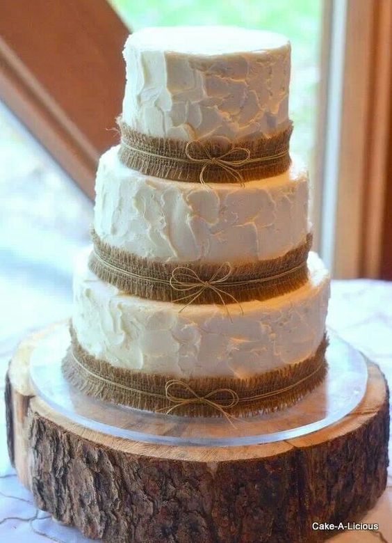 rustic country buttercream wedding cake with burlap details