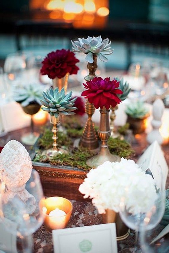 succulents & single blooms on candlesticks wedding centerpiece