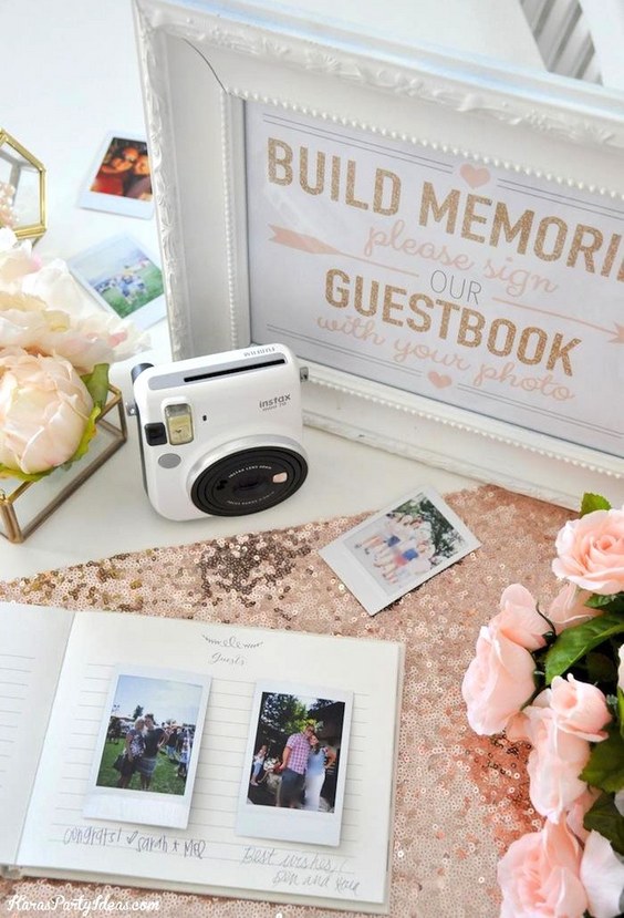 vintage white wedding guest book with polaroid