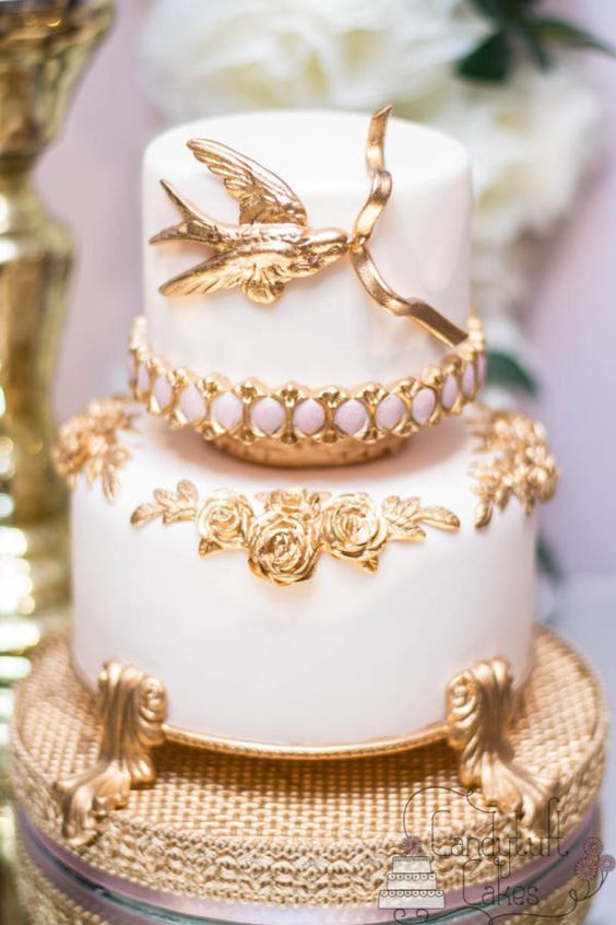white and gold bird baroque wedding cake
