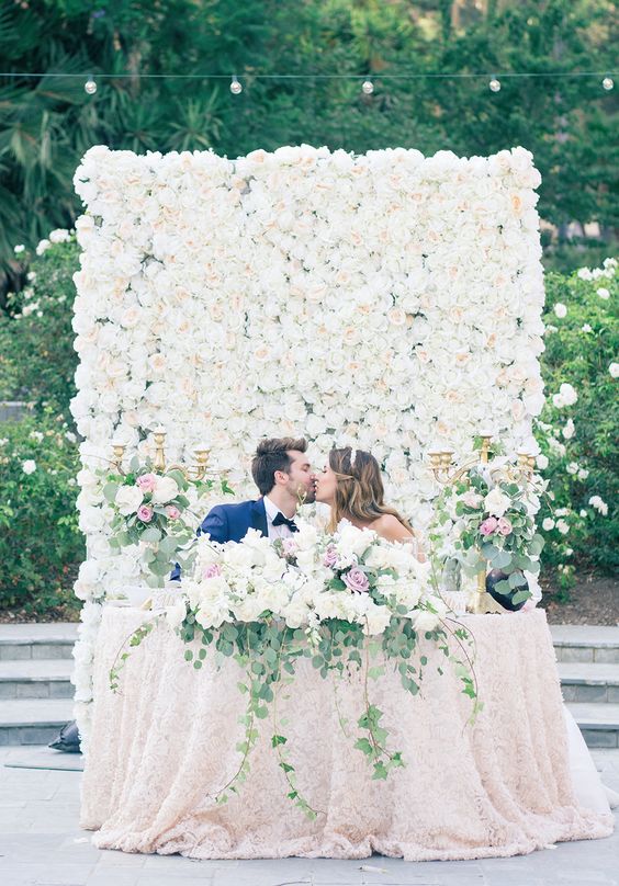 Lush greenery floral wall wedding backdrop