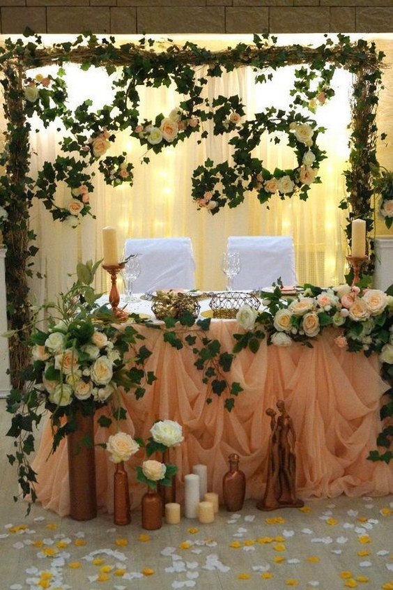 ivory and greenery wedding sweetheart table idea