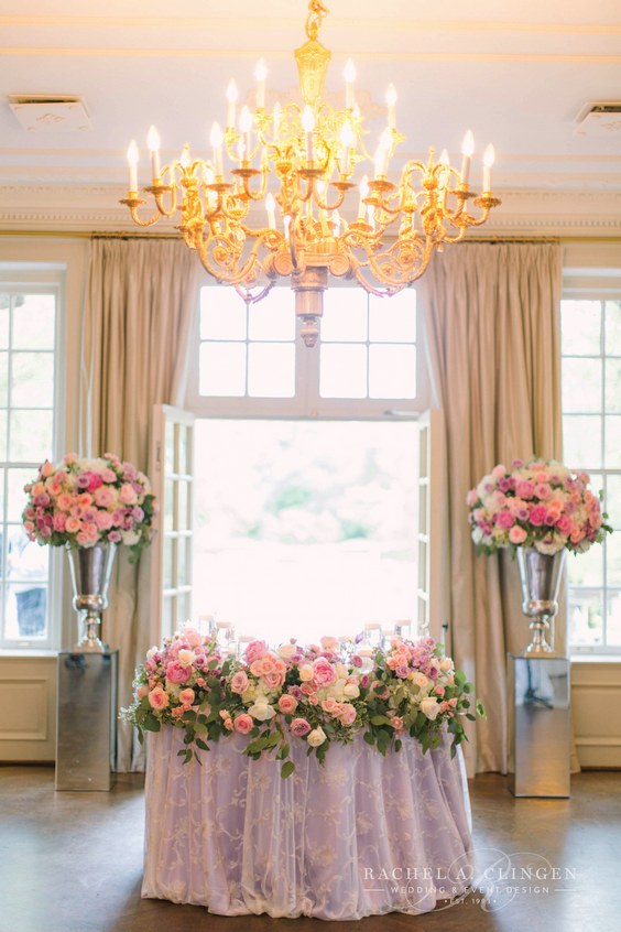 luxury pink and lilac wedding sweetheart table