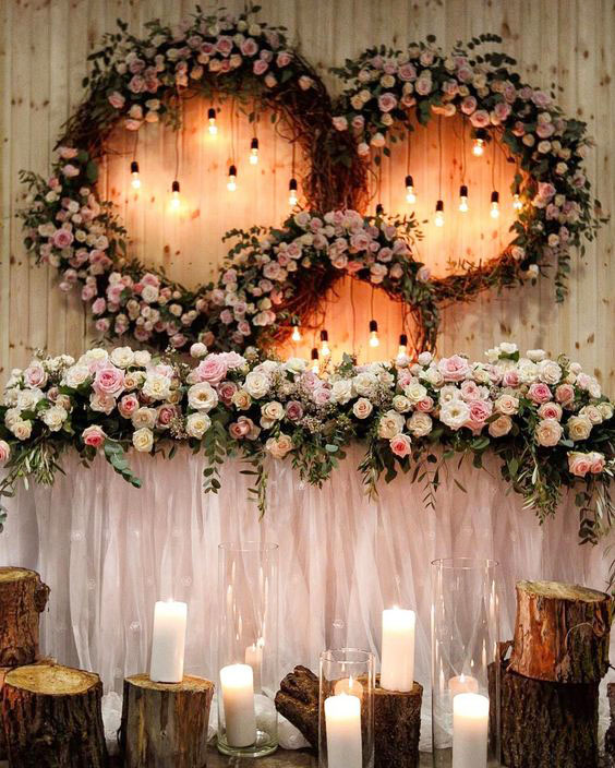 rustic luxury roses and tree stump wedding sweetheart table