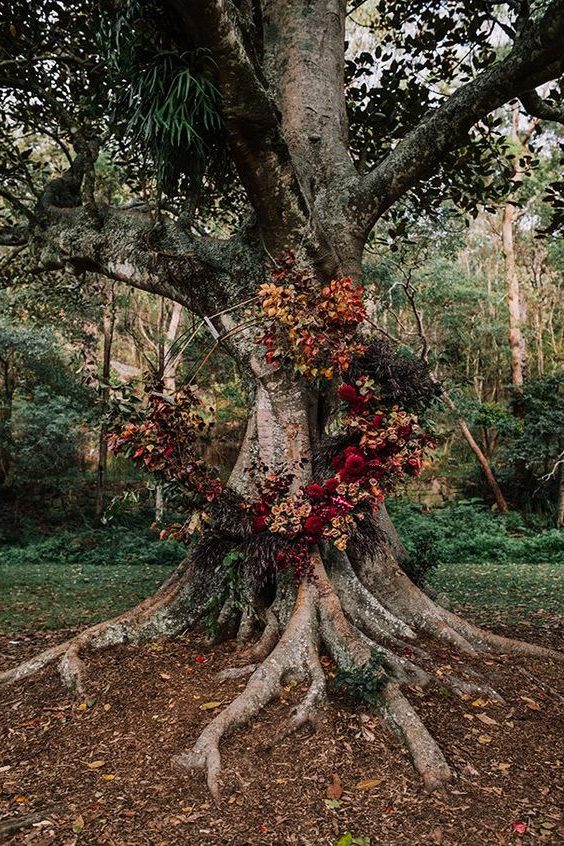 rustic fall burgundy and deep red flowers wedding backdrop