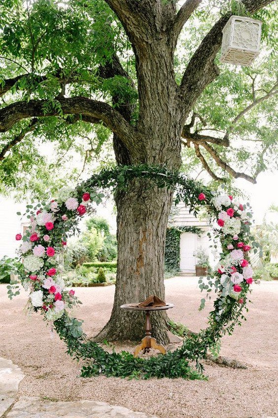 Greenery wreath wedding ceremony backdrop