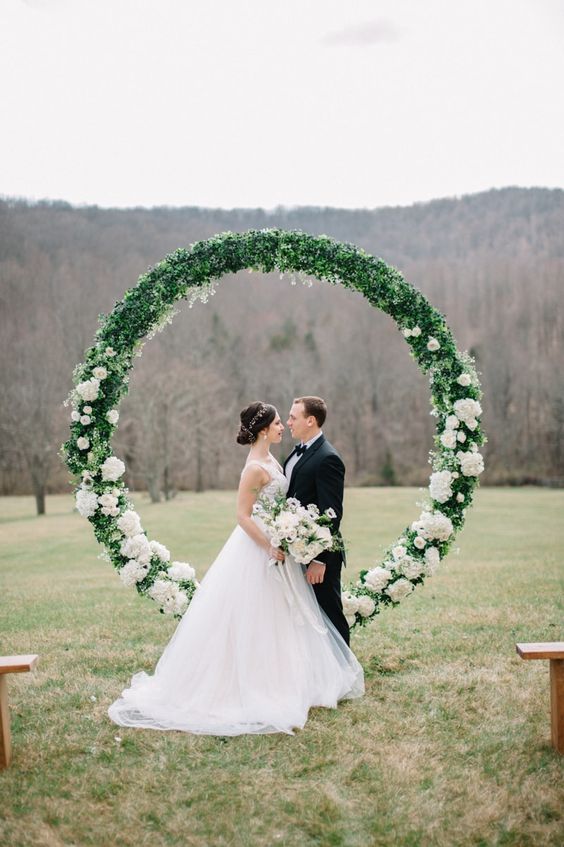 circle floral arbor from colorful wedding inspiration shoot