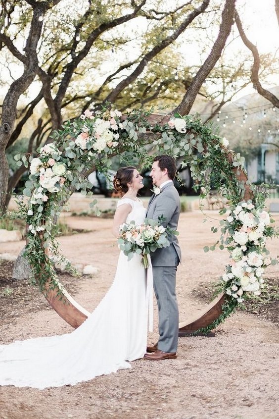 garden floral and wood circular wedding arch