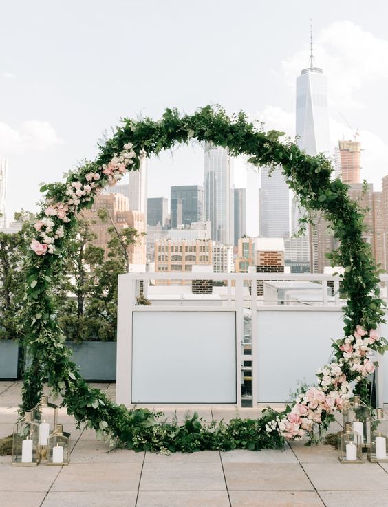 modern giant floral wreath wedding ceremony backdrop