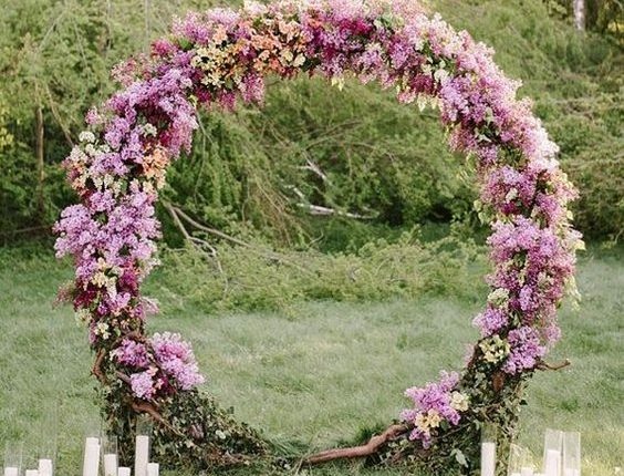 purple flower wreath wedding arch ideas