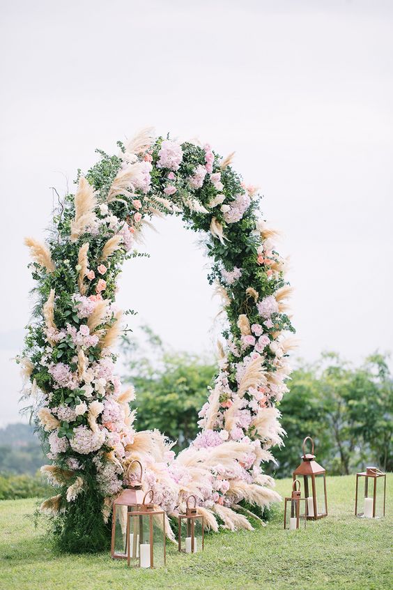 stunning circular floral arch for a beautiful wedding