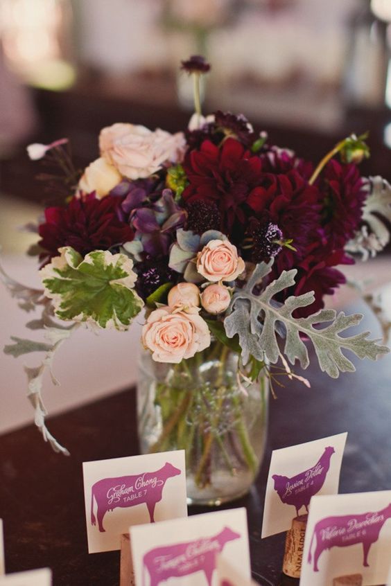 Burgundy purple cream wedding centerpiece