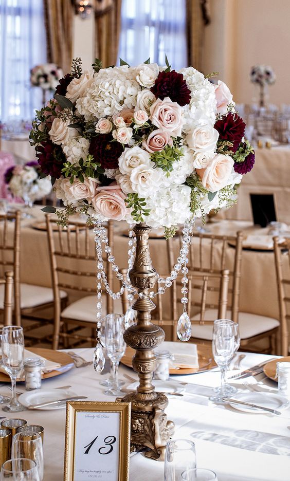 Tall burgundy and blush wedding centerpiece